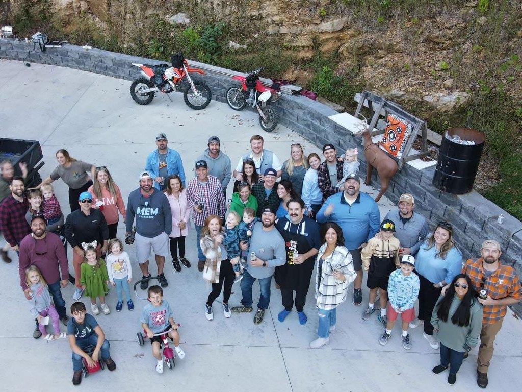 Neighbors and families at the CountryLand Roofing annual wing-off