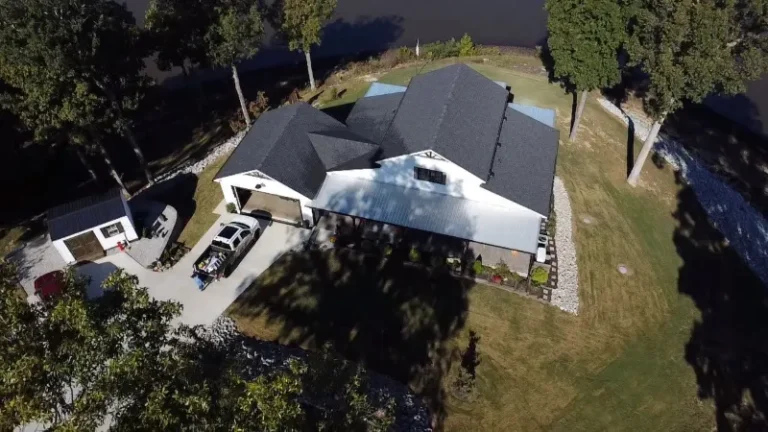 Drone view of a new roof and detached garage