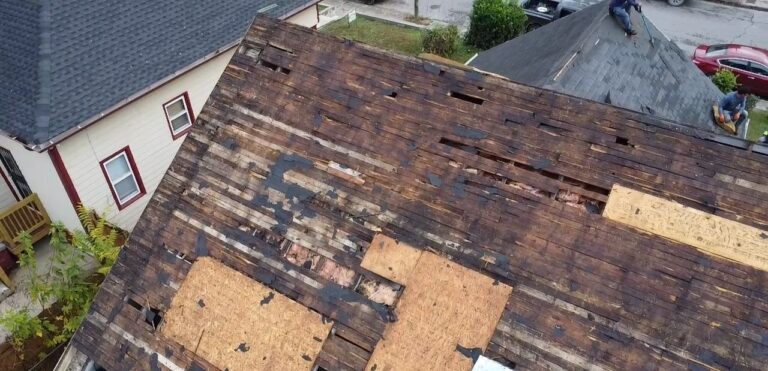 Old plank decking patched with new plywood in Nashville