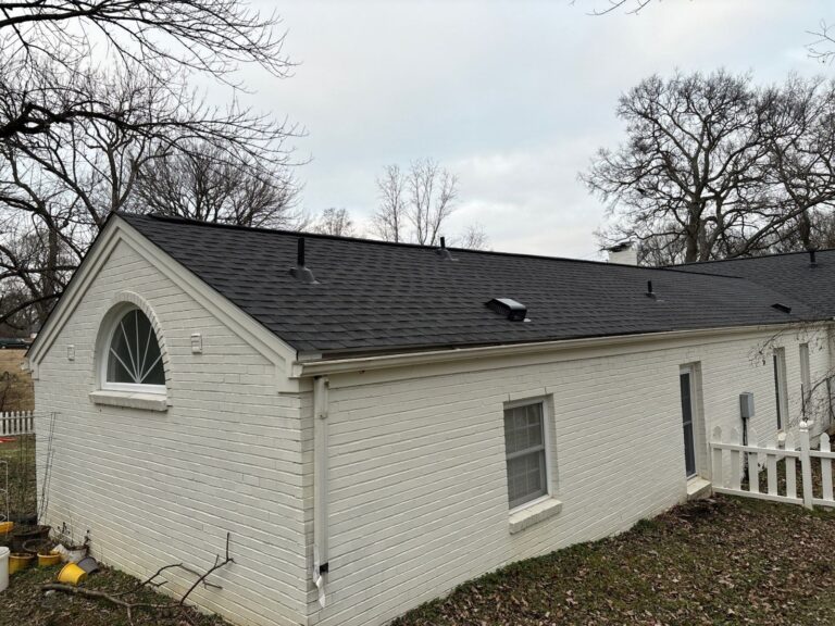 New roof on a white brick home in Nashville