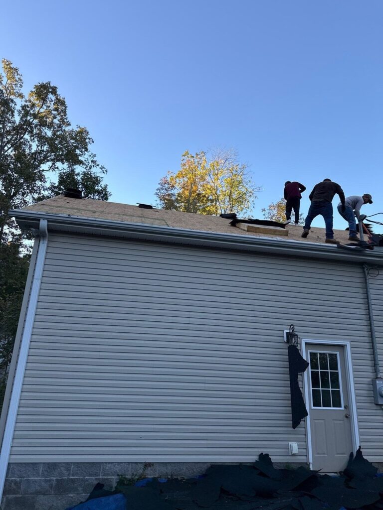 Our crew installing a new roof in Waverly